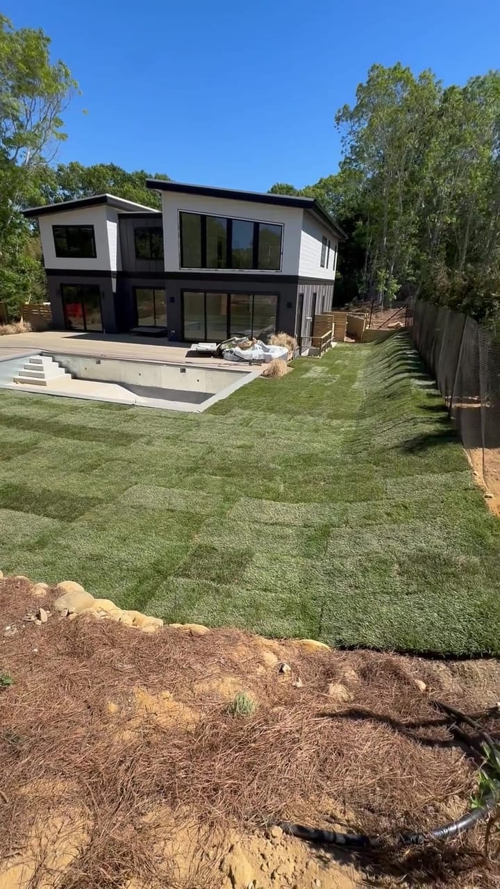 The finished 3,000 sq ft fresh-cut sod lawn at a Montauk, NY property