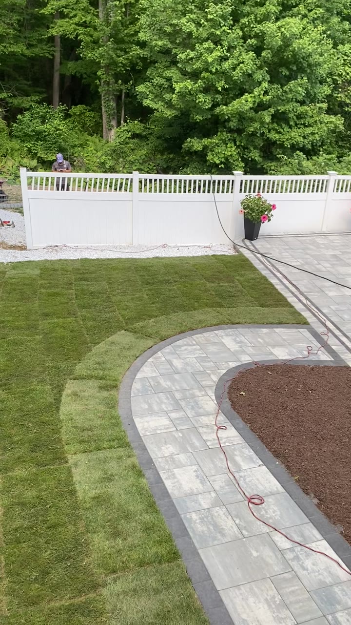 The finished Kentucky Bluegrass sod around the new pool patio in Milford, CT